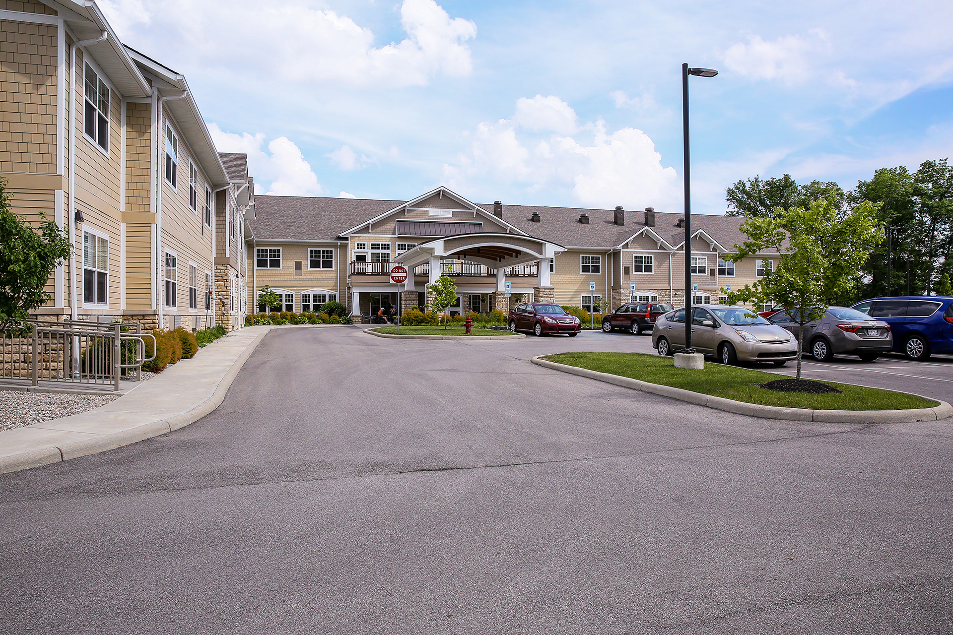 external view of the Trilogy Senior Living building and parking lot
